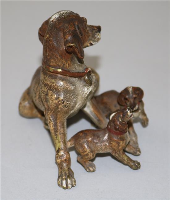 A late 19th century Austrian cold painted bronze group of a dog with two pups, H.3.25in.